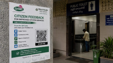 Man using public toilet in Hyderabad, promoting citizen feedback for civic space improvements.