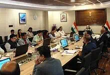 Hyderabad Police officials discuss Operation Octopus and anti-fraud AI technology in a formal meeting roo.
