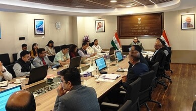 Hyderabad Police officials discuss Operation Octopus and anti-fraud AI technology in a formal meeting roo.