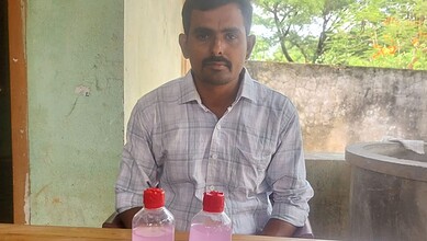 A Telangana forest beat officer is seen in custody after landing in ACB net, related to corruption allega.