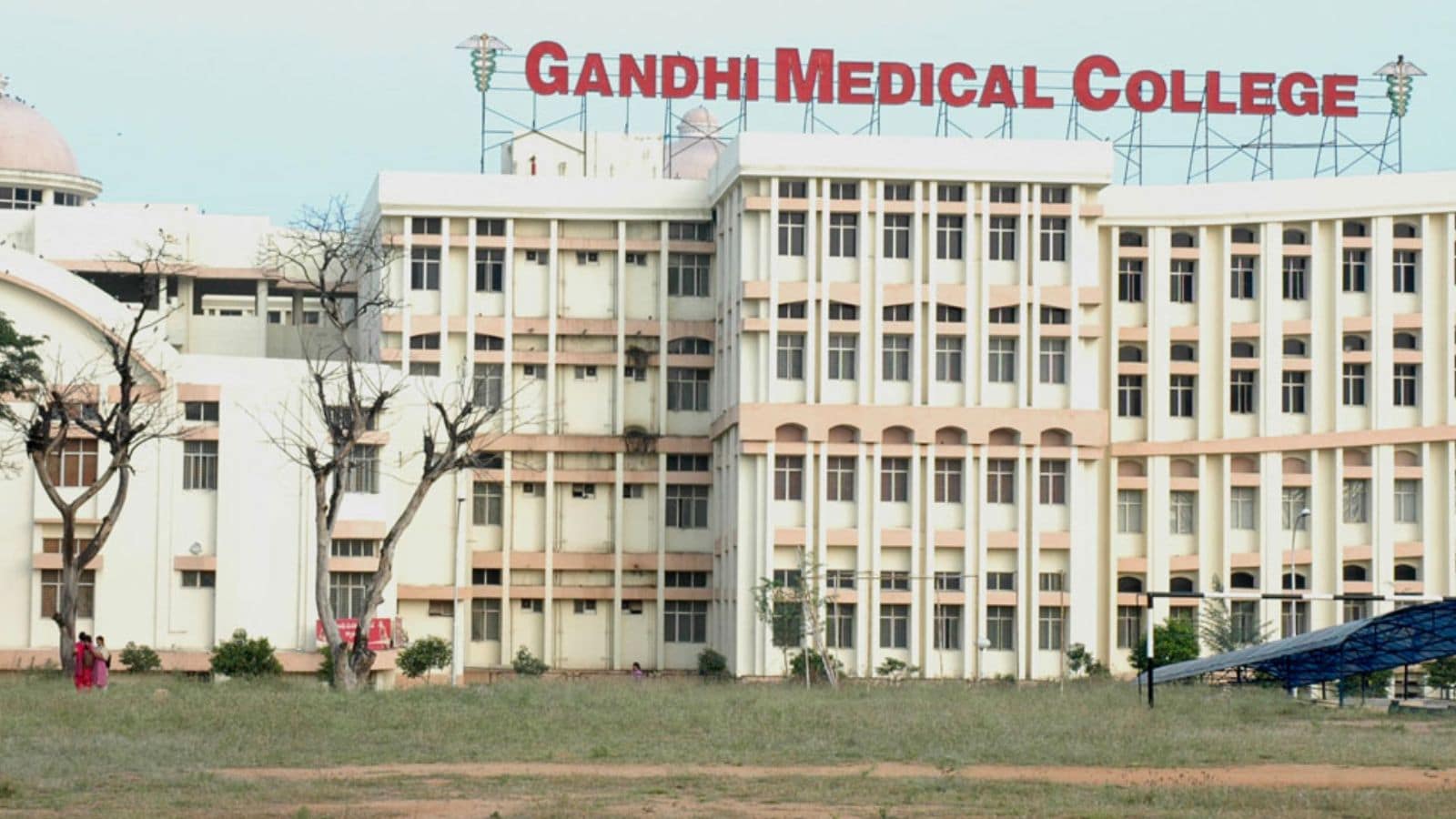 Gandhi Medical College exterior with signage, showing the campus infrastructure.