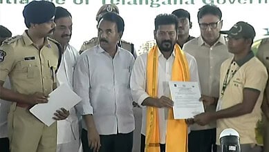The image shows Chief Minister A Revanth Reddy handing over the Giri Darshak training certificate to one of the former Maoists at an official programme held in Future City on Tuesday, April 28, 2026.