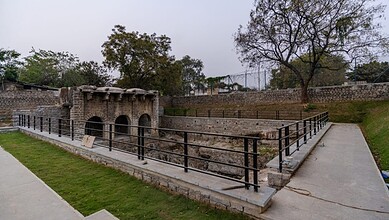 Ancient stepwell on Osmania University campus in Hyderabad, restored to preserve historical heritage.