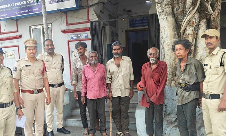 Hyderabad police rescuing five destitute men found on a footpath and taking them to a shelter.