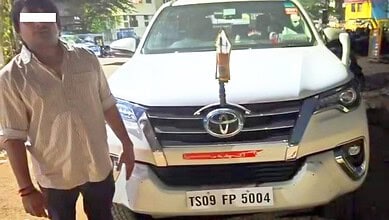 Man using siren and VIP stickers on private SUV in Hyderabad.