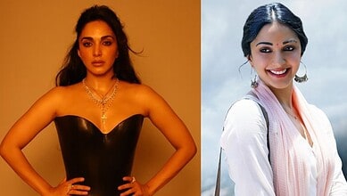 Kiara Advani wearing a cross pendant necklace, showcasing her stylish accessory choice.