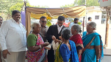 The image shows the senior citizens celebrating after they received R&R benefits for alienating their lands for the construction of Mallanna Sagar Reservoir under the Kaleshwaram Project on Tuesday, April 14, 2026.