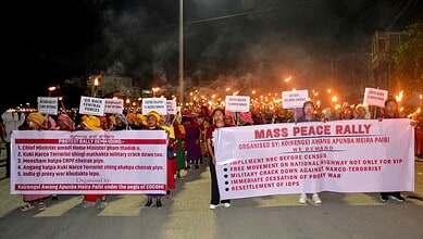 Thousands gather at night rally in Manipur protesting violence after children’s deaths.