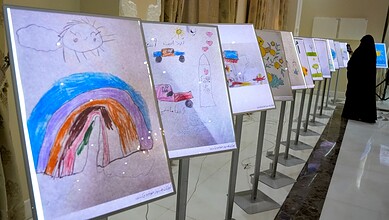 Children's colourful drawings from Minab school showcased in India.