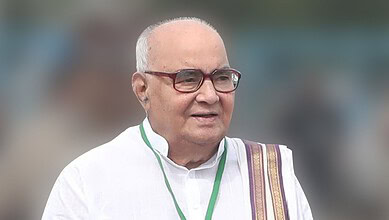 Image of Nadendla Bhaskara Rao, former Andhra Pradesh Chief Minister, wearing glasses and traditional att.