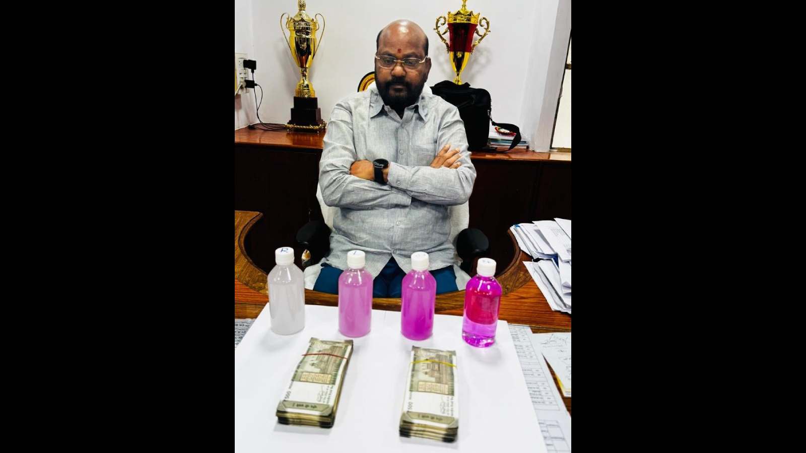 Dr M Goverdhan caught while taking a bribe