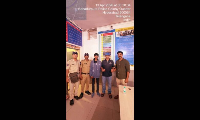 Amanulla Shareef is seen with his father and Bahadurpur police officials