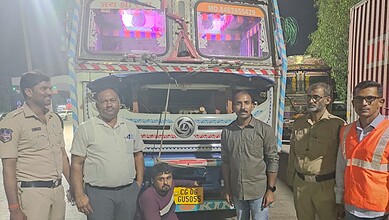 Seized 35 tonnes of PDS rice worth Rs 10L intercepted near ORR in Shamirpet, with authorities inspecting.