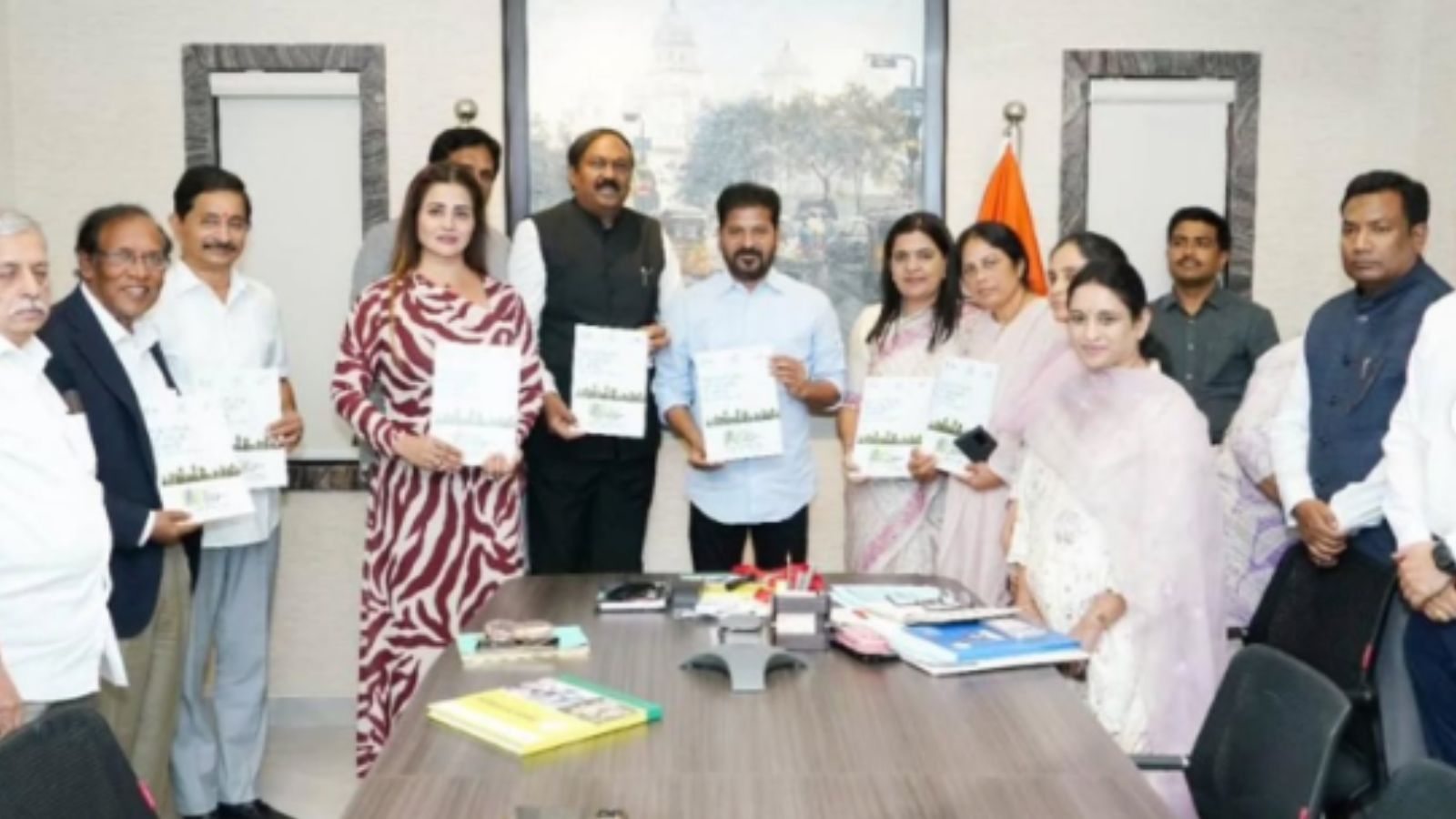 The image shows Telangana CM A Revanth Reddy with the representatives of corporate companies during a meeting on CSR funds held on Wednesday, April 8, 2026.