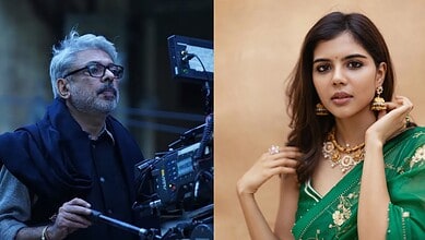 Kalyani Priyadarshan in traditional green saree with jewellery, on set for Madhubala biopic.