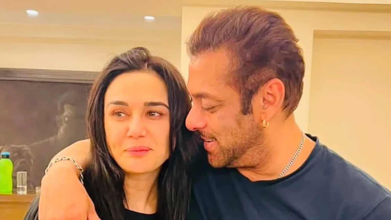Salman Khan with a woman, smiling and close, at a social event.