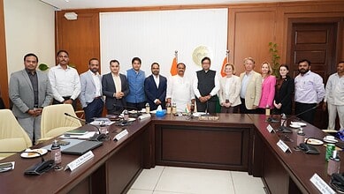 Group of officials and business leaders at a meeting in Telangana discussing MedTech and manufacturing in.