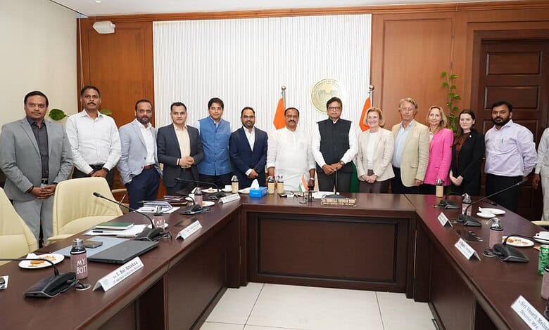 Group of officials and business leaders at a meeting in Telangana discussing MedTech and manufacturing in.