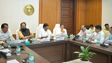 Telangana Deputy CM and officials discuss revised land market values in a formal meeting.