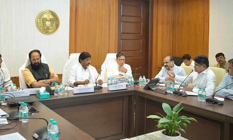 Telangana Deputy CM and officials discuss revised land market values in a formal meeting.