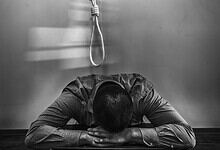 Student in despair after receiving disappointing exam results.