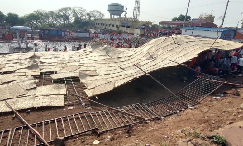 Devotees stuck under the collapsed pandal in Jagtial