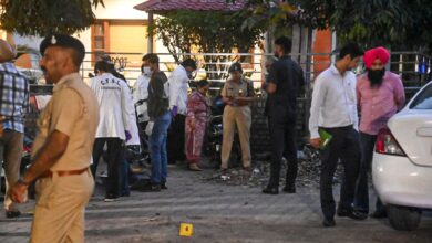 Police officials inspect BJP office after blast