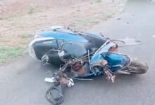 A two-wheeler mangled in the accident in Vikarabad