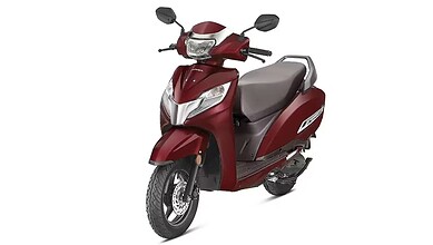 Hyderabad constable riding a red scooter, involved in an identity mix-up, highlighting a scooter confusio.