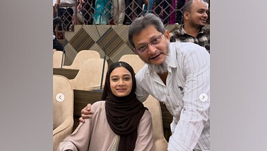 AIMIM corporator Sahar Shaikh and her father at a public event denying irregularities in caste certificat.