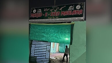 Mosque entrance in Hyderabad, Telangana, damaged during recent demolition, sparking protests and condemna.
