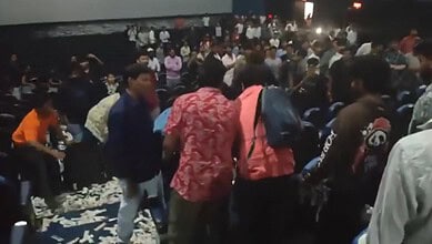 Crowd of excited Prabhas fans causing chaos during a song at a theatre in Hyderabad.