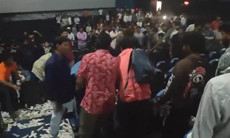 Crowd of excited Prabhas fans causing chaos during a song at a theatre in Hyderabad.