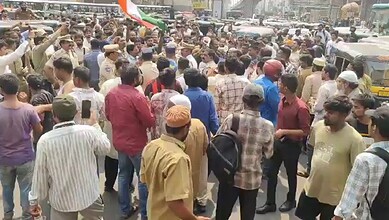 Protest by Hyderabad auto drivers opposing district autos plying in the city, causing traffic disruptions.