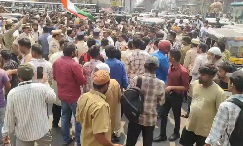 Protest by Hyderabad auto drivers opposing district autos plying in the city, causing traffic disruptions.