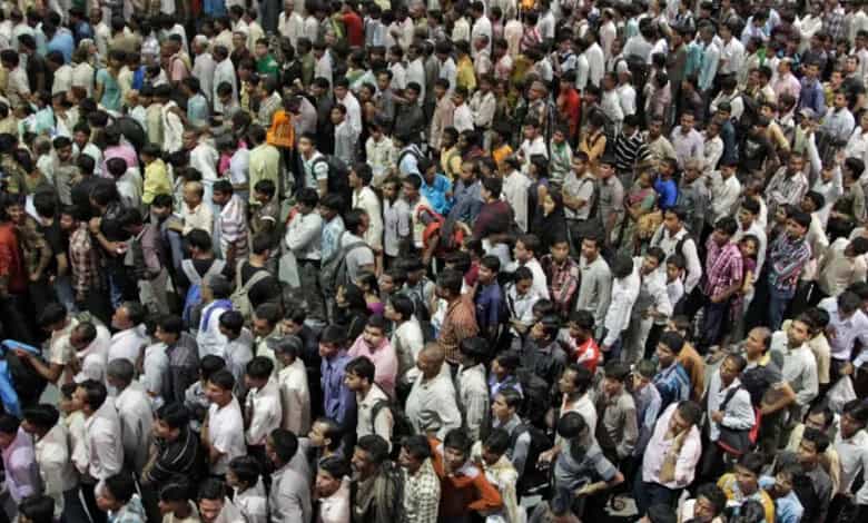 Crowd of Telangana residents at a public gathering, emphasizing the importance of self-enumeration for th.