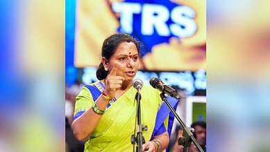 Indian woman politician addressing a crowd with a passionate gesture.