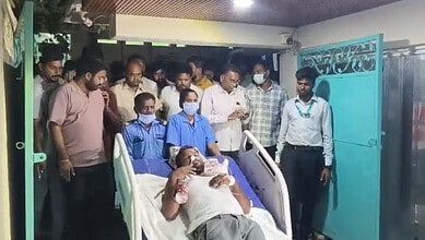 Patient in critical condition receives medical attention at a hospital in Nalgonda amid paddy procurement.