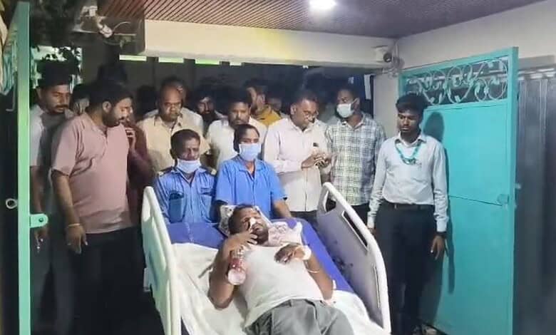Patient in critical condition receives medical attention at a hospital in Nalgonda amid paddy procurement.
