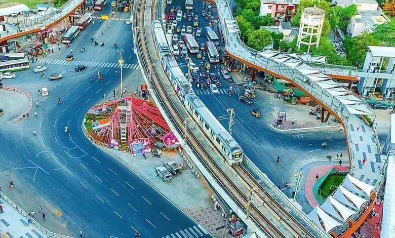 Aerial view of Uppal Ring Road with diversions and traffic congestion due to flyover construction.