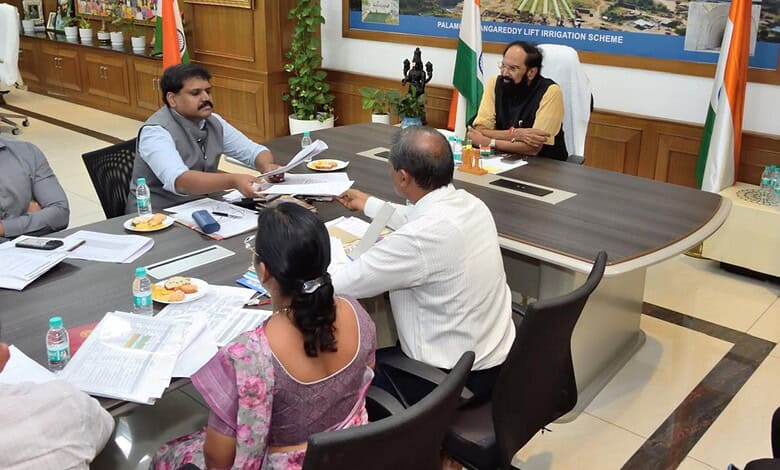 Telangana government officials discuss paddy procurement plans with Uttam Kumar in a meeting.