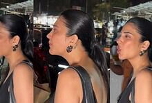 Shruti Haasan looks irritated with paparazzi at night, expressing her frustration during a public outing.