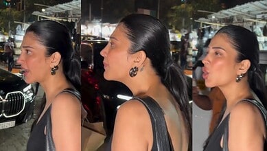 Shruti Haasan looks irritated with paparazzi at night, expressing her frustration during a public outing.