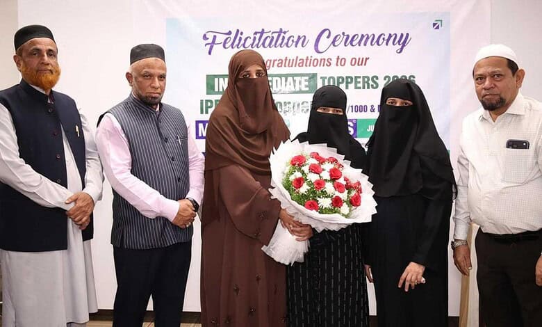 Telangana inter topper from MS Junior College receiving a bouquet at the felicitation ceremony.