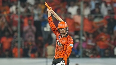Abhishek hits a six, leading Sunrisers Hyderabad to a commanding 242/2 against Delhi Capitals.