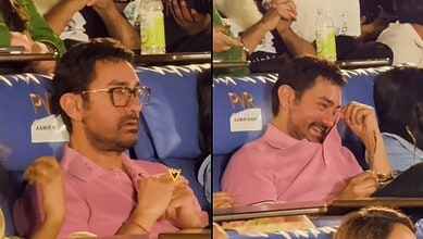 Aamir Khan appears emotional during his son Junaid's film event, showing a heartfelt moment.