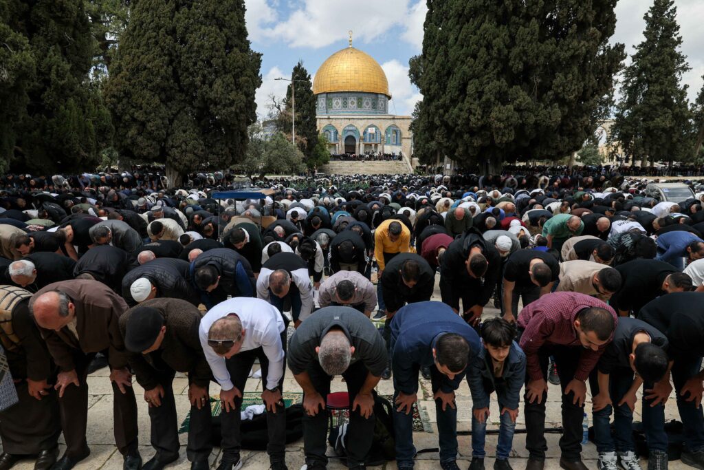 Large crowd of Palestinian worshippers perform Friday prayers at Al-Aqsa Mosque in Jerusalem.