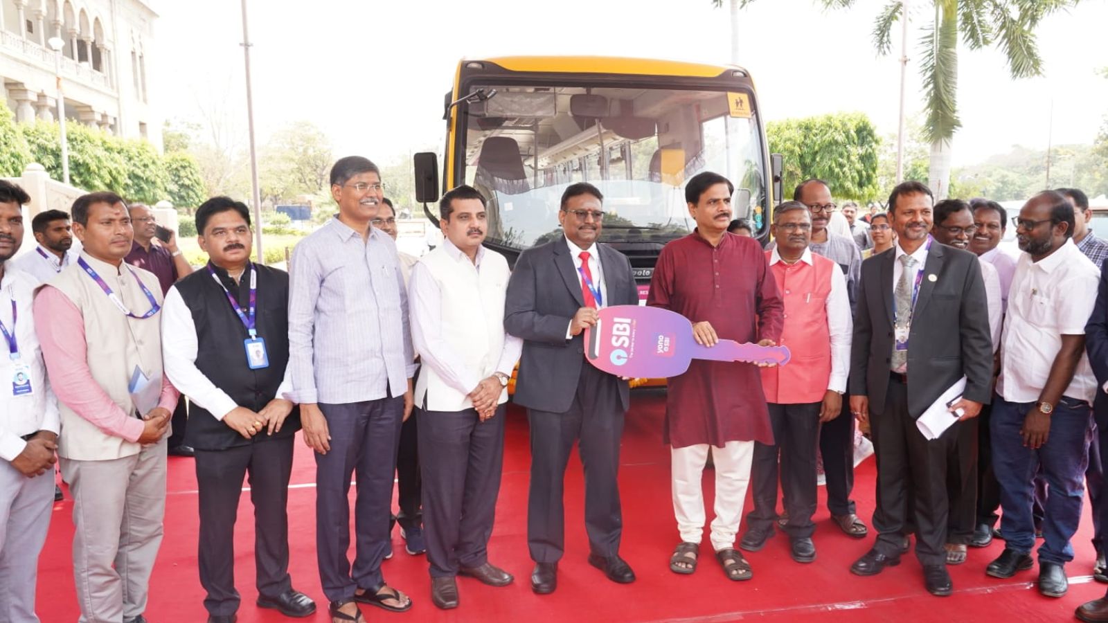 SBI hands over three buses to Osmania University as part of a CSR initiative