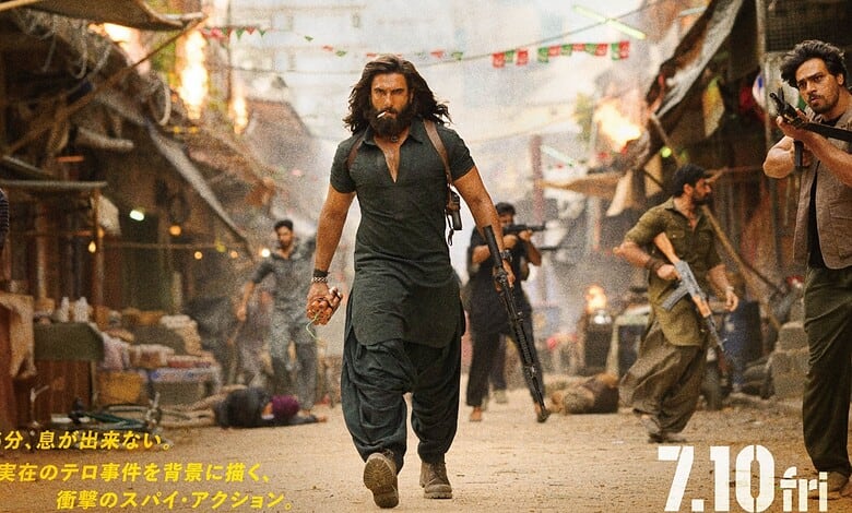 An intense scene with Ranveer Singh as Dhurandhar leading a group in a chaotic street setting.