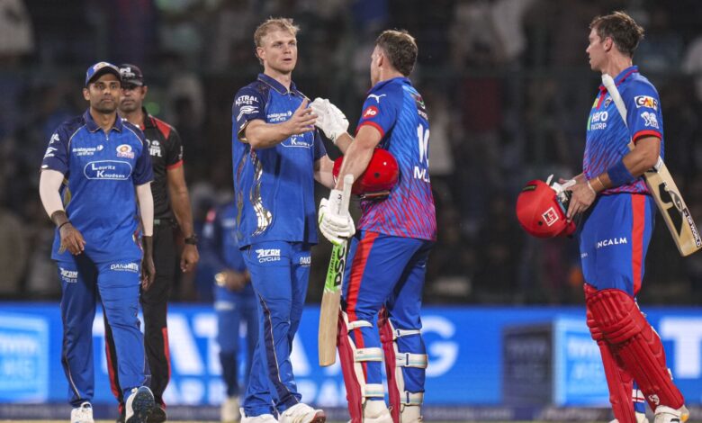 New Delhi: Delhi Capitals' Tristan Stubbs, right, and David Miller, front centre, being congratulated by Mumbai Indians' Corbin Bosch, front left, after winning the Indian Premier League (IPL) 2026 T20 cricket match between Delhi Capitals and Mumbai Indians, in New Delhi, Saturday, April 4, 2026. (PTI Photo/Ravi Choudhary)
